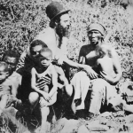 A Christian missionary with a group of Africans in the Transvaal region of South Africa, 1864. Photo by Hulton Archive/Getty Images.