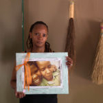 2 October 2018: Christine Nxumalo holds a portrait of her sister Virginia Machpelah, one of the victims of Life Esidimeni, and her niece Shanice Machpelah, who died on the first day of the hearings into the spiral of abuse.