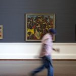 27 February 2019: (From left) A man moves past Maurice Van Essche’s ‘Native Woman’ and Irma Stern’s ‘Bahutu Musicians’ and ‘Malay Bridesmaids’, on show at the All Your Faves are Problematic’ exhibition. (Photography by James Oatway)