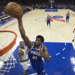 27 November 2017: Cameroonian Joel Embiid of the Philadelphia 76ers dunks the ball against the Cleveland Cavaliers at the Wells Fargo Center in Philadelphia. (Photograph by Mitcell Leff/Getty Images)