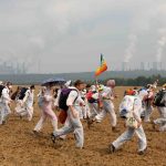 26 August 2017: Protesters opposing open-pit coal mines in the Rhineland region near Bedburg, Germany. Protesters, seeking to bring attention to the impact of coal on climate change, converged on the region for two days of disruptive disobedience. (Photo