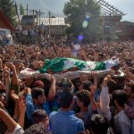 17 September 2016: Kashmiri Muslims carry the body of Nasir Shafi, an 11-year-old killed by Indian government forces, during his funeral in Srinagar, Kashmir. (Photograph by: Yawar Nazir/Getty Images)