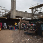 31 October 2018: The construction of a massive mall overlooks the tiny spaces used by the street traders of Denneboom in Mamelodi after their stalls were destroyed to make space for the mall.