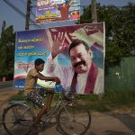 16 November 2018: A giant poster of acting Prime Minister Mahinda Rajapaksa in his hometown of Tangalle, Sri Lanka. (Photograph by Paula Bronstein/Getty Images)