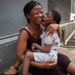 5 March 2019: Leah Ndanga and her son, Emmanuel, outside their home.