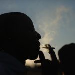 2 July 2013: A youth smokes weed in Soweto. Photo by Christopher Furlong/Getty Images.