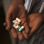 28 November 2014: A patient with antiretroviral pills at Nkosi's Haven, south of Johannesburg. (Photograph by Siphiwe Sibeko/Reuters)