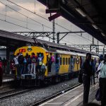 15 November 2018: Commuters are often forced to ride outside the carriages of the trains because they are filled to capacity during peak hours.