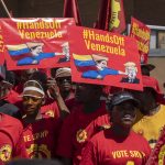 16 March 2019: National Union of Metalworkers of South Africa members protest outside the US consulate in Sandton, Johannesburg, in solidarity with the Venezuelan government and against American interference in the country.