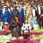 11 April 2001: South African rescue services work around the victims of a stampede at Ellis Park Stadium in Joburg in which 43 people died. Kaizer Chiefs were playing Orlando Pirates in the overfull stadium. (Photograph by Gallo Images/City Press/Mpho Mph