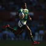 3 April 2011: Tshotsho Mbovane of South Africa powers away to score a try against England on day two of the 2011 Adelaide IRB Rugby Sevens at Adelaide Oval in Adelaide, Australia. (Photograph by Mark Kolbe/Getty Images)