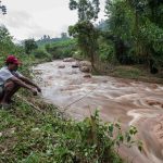 24 April 2019: Scelo Mtshali, 35, at the Umhlatuzana River, which burst its banks and flooded his shack in the nearby eKukhanyeni settlement. The water destroyed Mtshali’s construction tools, which he uses to make a living doing building jobs.