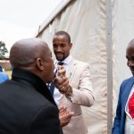 7 April 2019: Sundowns player Tiyani Mabunda, a devout follower of Prophet Bushiri of the ECG church, sprays anointed water into a friend's mouth.