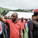 28 April 2019: Abahlali baseMjondolo president S’busiso Zikode waves to supporters as he walks alongside his wife, Sindy, at the movement’s UnFreedom Day rally in Durban.