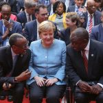 30 October 2018: (From left) Rwanda’s President Paul Kagame, Germany’s Chancellor Angela Merkel and South Africa’s President Cyril Ramaphosa at the G20 Investment Summit in Berlin, Germany. (Photograph by Christian Marquardt - Pool/Getty Images)