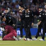 22 June 2019: New Zealand players console West Indies allrounder Carlos Brathwaite after he lost his wicket and the match against them at Old Trafford during the ICC Cricket World Cup. (Photograph by Action Images via Reuters/Lee Smith)