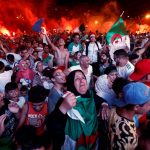 14 July 2019: Football fans in Algiers after Algeria won their Africa Cup of Nations semifinal against Nigeria. (Photograph by Reuters/Ramzi Boudina)