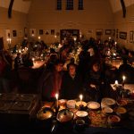 30 June 2019: Festivalgoers queuing for food at the Long Table, a popular pop-up restaurant that only opens in the St Michael and St George Cathedral church hall during the National Arts Festival.