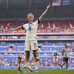 7 July 2019: Megan Rapinoe of the United States with the Fifa Women’s World Cup trophy alongside her personal Golden Boot and Golden Ball silverware. The US beat Netherlands in the final at Stade de Lyon in Lyon, France. (Photograph by Quality Sport Images/Getty Images)