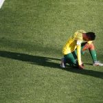 17 June 2019: South Africa's Mamello Makhabane kneels dejectedly after Banyana lost their World Cup group stage match against Germany at Stade de la Mosson in Montpellier, France. (Photograph by Reuters/Eric Gaillard)