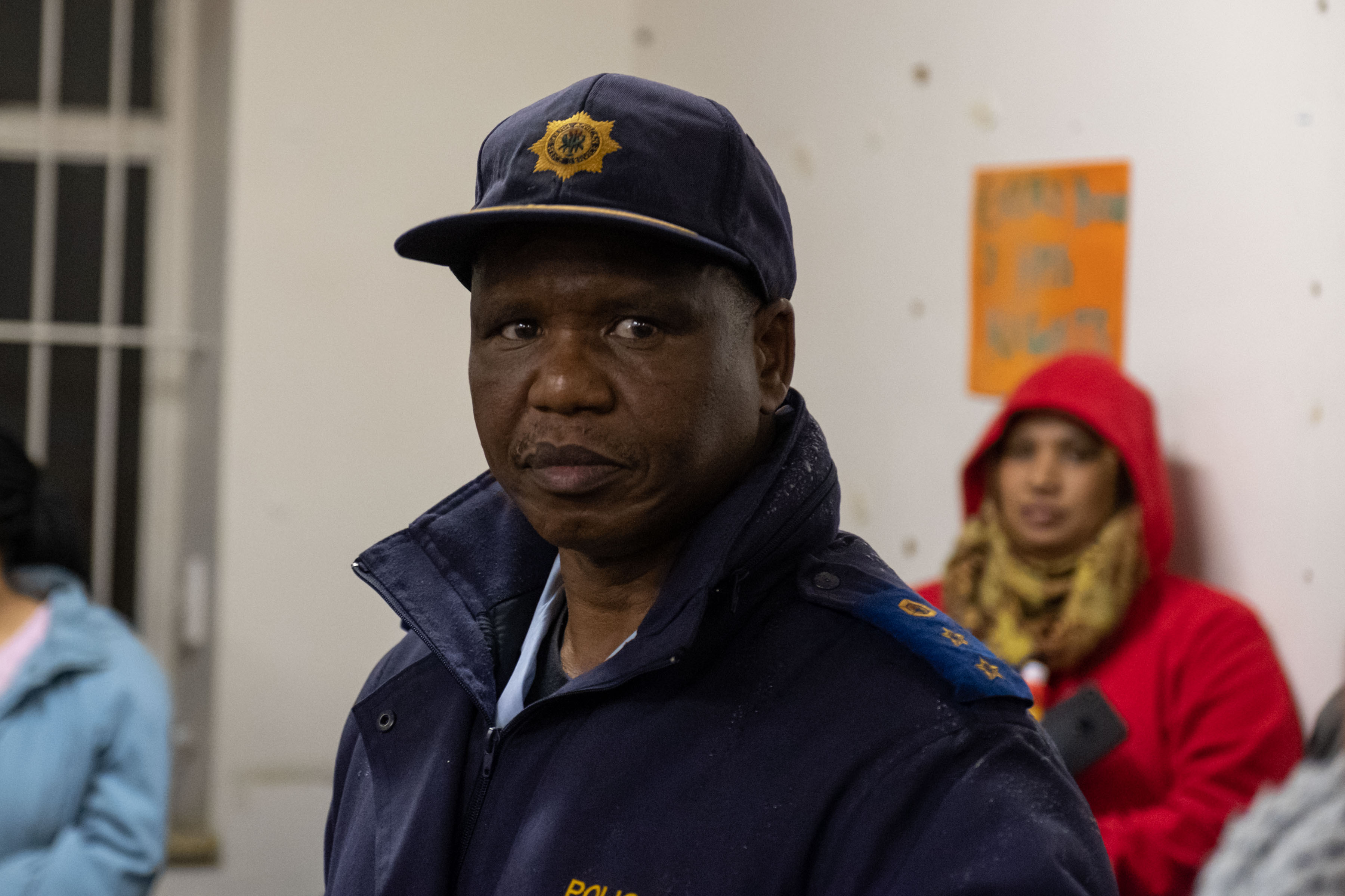 30 July 2019: Colonel Ntezo, the station commander at the Woodstock Police Station, came out to listen to the complaints of the residents but did not offer any direct answers to their questions about the reasons for the raid.