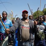 8 September 2019: A large group of men from inner-city hostels met with Mangosuthu Buthelezi in Malvern, Joburg, but did not respond well when he tried to dissuade them from participating in ‘purely xenophobic’ violence. (Photograph by James Oatway)