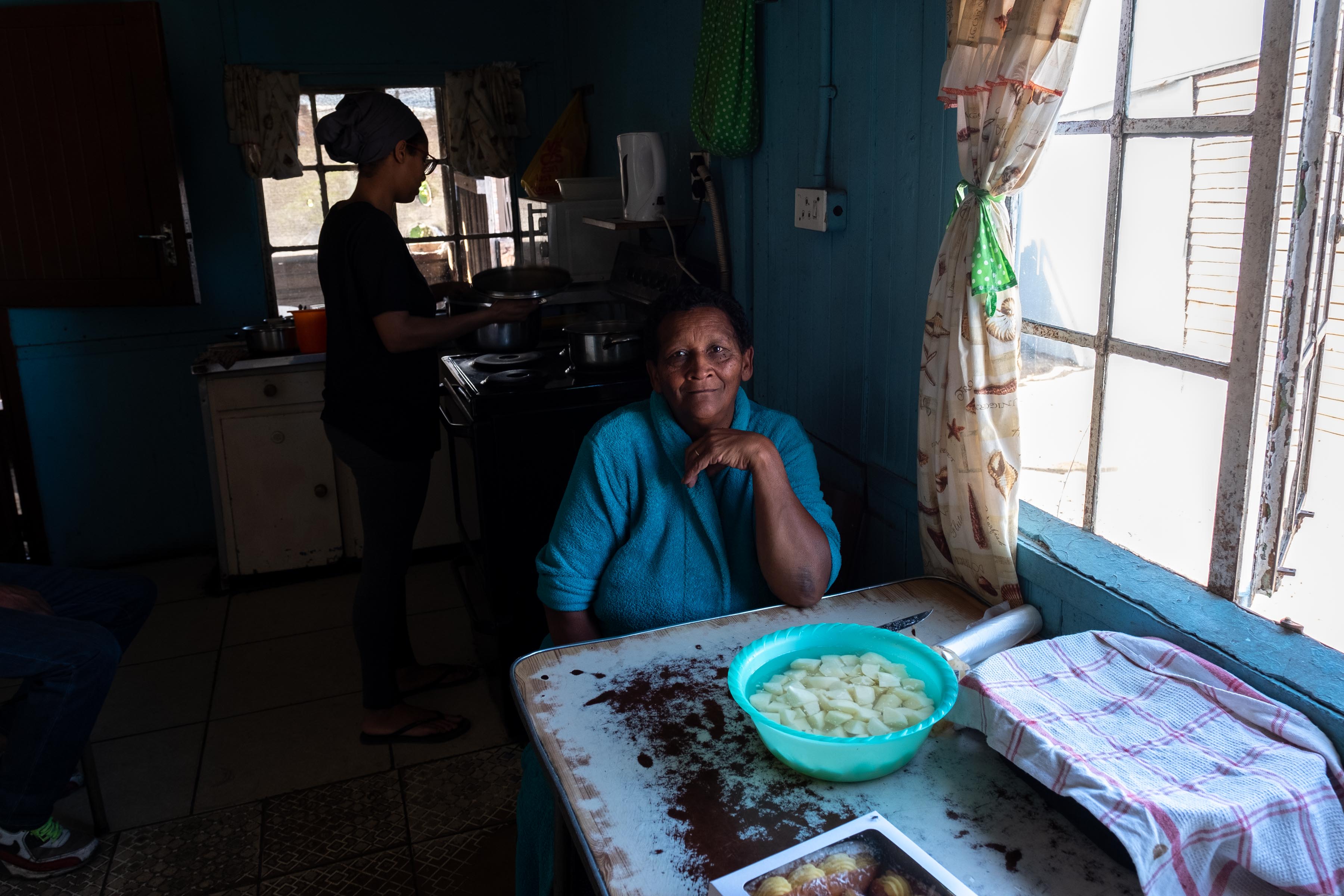 7 April 2019: Gene Adriaanse, Danny Adriaanse’s sister in-law, peels potatoes in her home on the Klipfontein Mission Station.