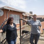 5 September 2019: Celeste Cameron, Nathalie van Rooyen (right) and other women banded together to prevent the Somali-run spaza shop on their street in Coronationville from being looted by a xenophobic mob.