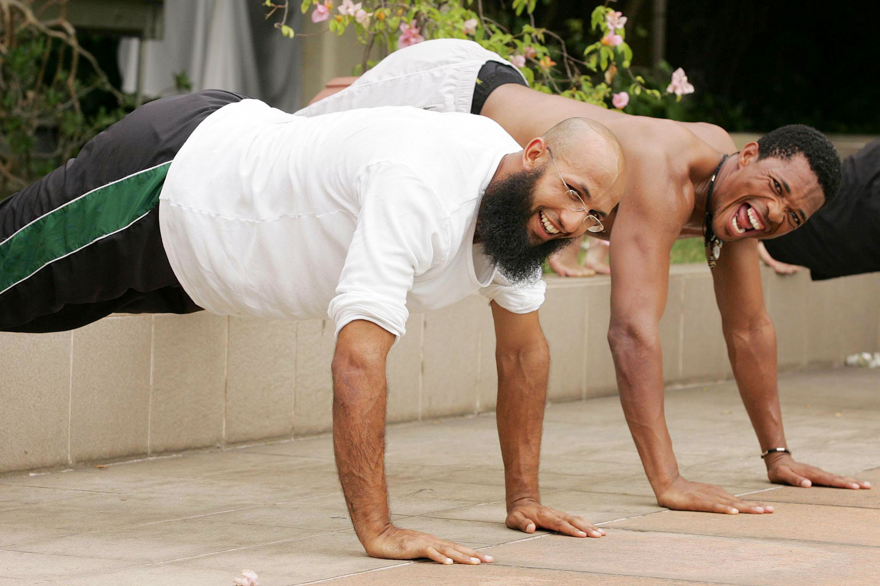 2 August 2006: Hashim Amla (left) and Makhaya Ntini during a warm-up session at the pool of the Taj Samudra Hotel in Colombo, Sri Lanka. The hosts won the Test series 2-0. (Photograph by Lee Warren/Gallo Images)