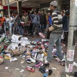 2 September 2019: Goods belonging to a street trader lie strewn across the sidewalk after a xenophobic mob rampaged through the Johannesburg CBD looting shops and attacking street traders as they went.