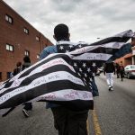 1 May 2015: Protesters march in support of Maryland state attorney Marilyn Mosby’s announcement that charges would be filed against Baltimore police officers after the death of Freddie Gray in Baltimore, Maryland. (Photograph by Andrew Burton/Getty Images)