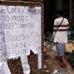 30 October 2019: The remains of a poster in central Cape Town after the police evicted refugees camped outside the United Nations High Commissioner for Refugees office with stun grenades, rubber bullets and water cannons. (Photograph by Ashraf Hendricks/GroundUp)