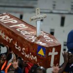 26 May 2018: Black Leopards supporters carry a coffin mourning the imminent demise of Platinum Stars during the National First Division Promotion and Relegation Playoff match between Stars and Leopards at Moruleng Stadium in Rustenburg. (Photograph by Lefty Shivambu/Gallo Images)