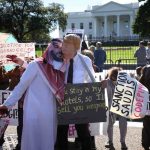 19 October 2018: A protester dressed as Saudi Arabian Crown Prince Mohammad bin Salman and another dressed as US President Donald Trump demonstrate with members of the group Code Pink outside the White House. (Photograph by Win McNamee/Getty Images)