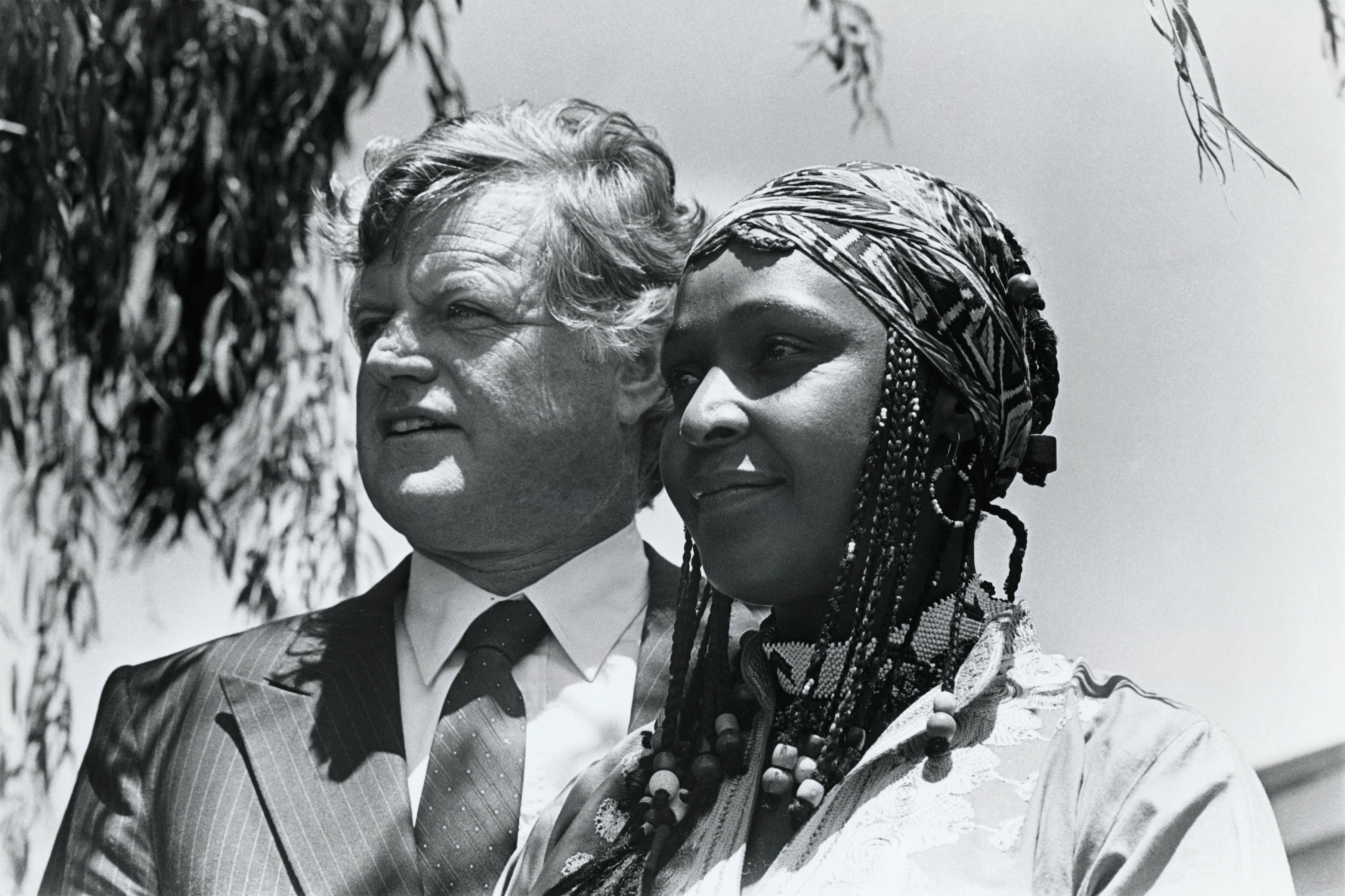 1984: United States senator Edward Kennedy with Winnie Madikizela-Mandela while she was in exile in Brandfort in the Free State, South Africa. (Photograph by Gideon Mendel/Corbis via Getty Images)