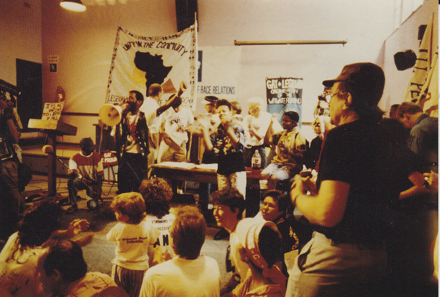 13 October 1990: Simon Nkoli (left) and Beverley Ditsie addressing the marchers prior to the first Pride in Johannesburg. (Donne Rundle Collection, Gala Queer Archives)