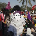 8 March 2018: People wearing masks depicting Qandeel Baloch, the social media celebrity who was strangled in an ‘honour killing’ in 2016, as they take part in an aurat or women’s march in Karachi, Pakistan. (Photograph by Reuters/Akhtar Soomro)