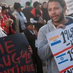 15 May 2018: Protestors outside the United States Consulate in Sandton, Johannesburg, object to US President Donald Trump moving the US embassy in Israel from Tel Aviv to Jerusalem. (Photograph by Dino Lloyd/Gallo Images/Getty Images)