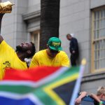 11 November 2019: Springboks Siya Kolisi and Francois Louw with the Webb Ellis Cup during the Cape Town leg of the Rugby World Cup Champions' tour in South Africa. (Photograph by Grant Pitcher/Gallo Images)