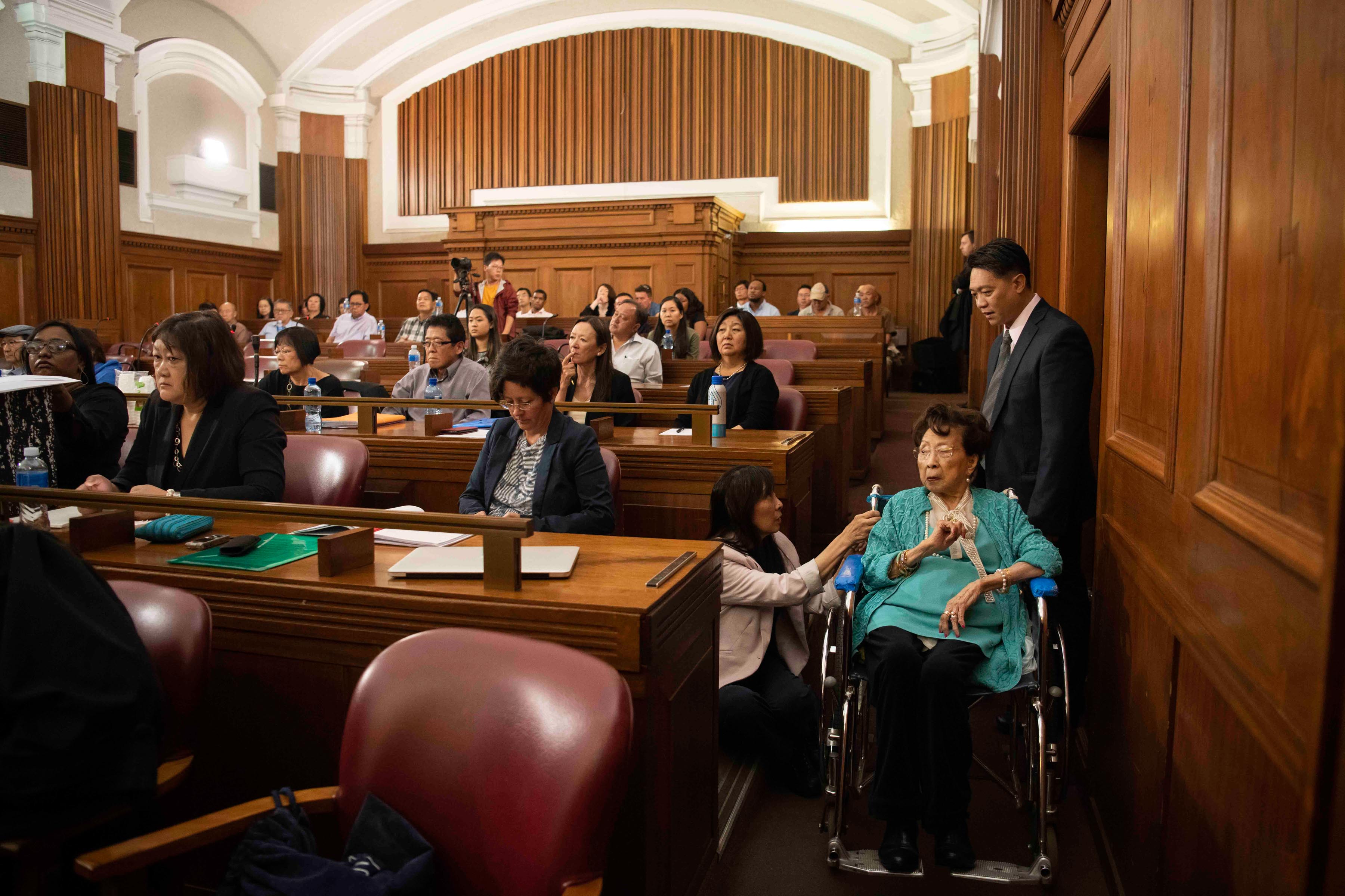 25 November 2019: Erwin Pon’s 106-year-old grandmother and a community leader, Ng Sui Chee Pon (seated in wheelchair), came to court to hear his testimony.