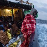 19 February 2017: Refugees and migrants on the deck of a Spanish rescue vessel, sailing towards the Italian port of Pozzallo after being rescued off the coast north of Sabratha, Libya. (Photograph by David Ramos/Getty Images)