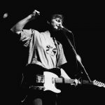 6 October 1991: Billy Bragg on stage, fist raised, at the Het Paard music venue at The Hague, Netherlands. (Photograph by Peter Pakvis/Redferns)