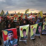 8 November 2015: A funeral procession for eight members of the Kurdish People’s Protection Units, seven of whom were killed by an Isis car bomb, in Derek, Rojava, Syria. (Photograph by John Moore/Getty Images)