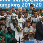 14 December 2019: Centre, Captain Hlompho Kekana celebrates with Mamelodi Sundowns after winning the Telkom Knockout final against Maritzburg United at Moses Mabhida Stadium in Durban, South Africa. (Photograph by Anesh Debiky/Gallo Images)