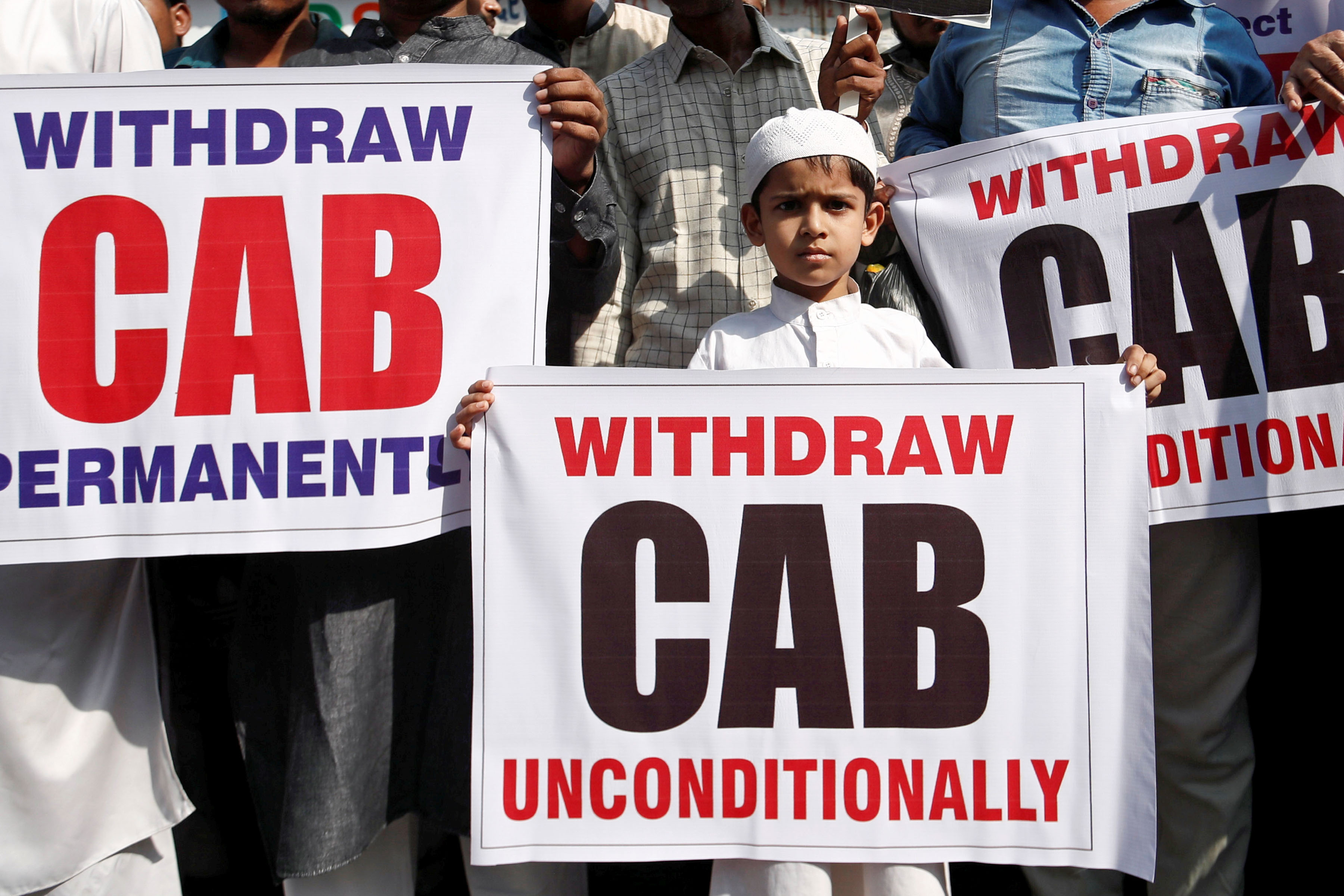 13 December 2019: A boy holding a placard during a protest in Mumbai against the Citizenship Amendment Bill, which has clear similarities with the antisemitic Nuremberg Laws imposed in Europe in 1935. (Photograph by Reuters/Francis Mascarenhas)