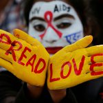 30 November 2018: A student with her face and hands painted during an HIV and Aids awareness campaign on the eve of World Aids Day in Chandigarh, India. (Photograph by Ajay Verma/Reuters)