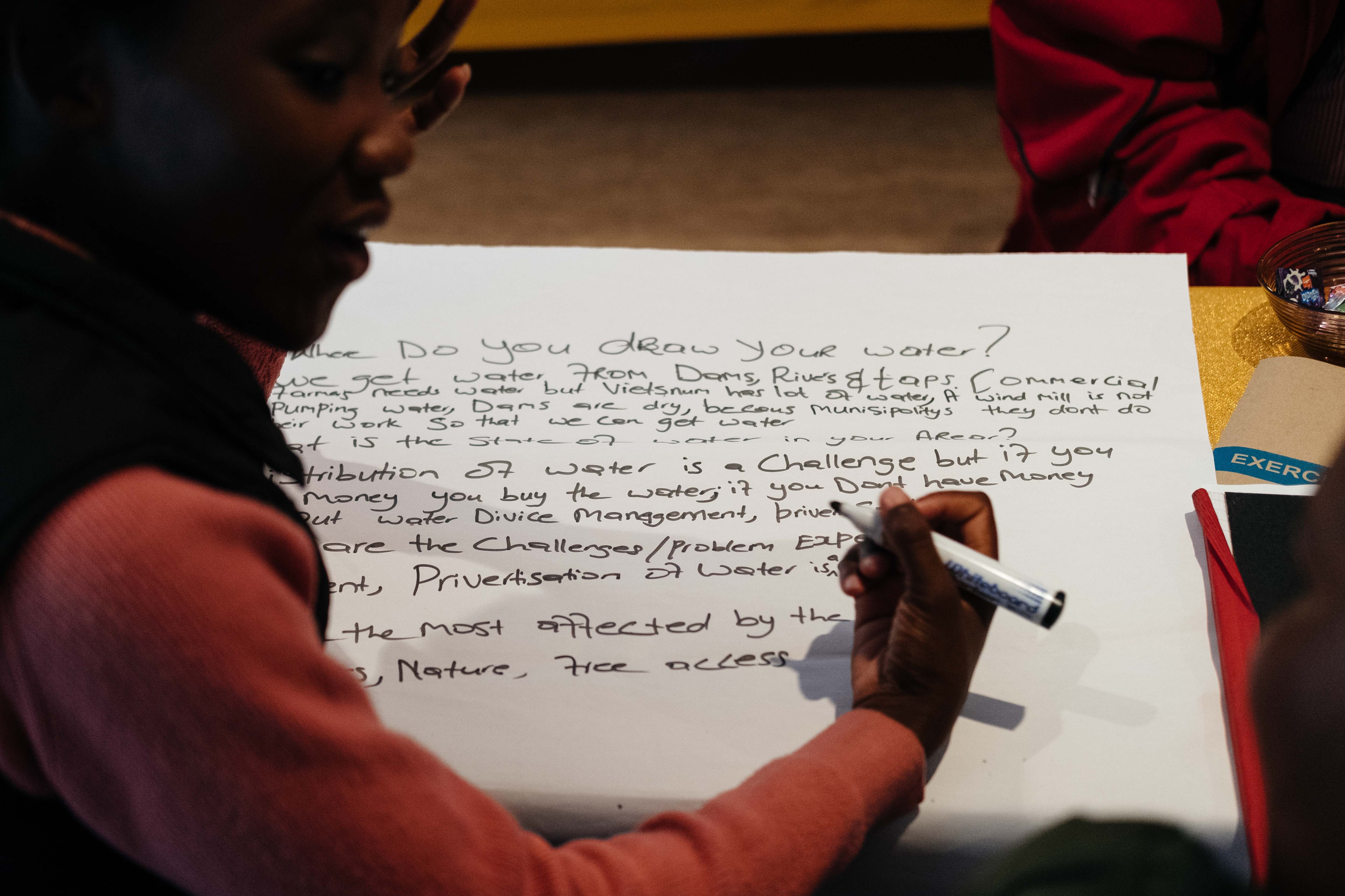 11 November 2019: Sinalo Qaba, one of the meeting’s facilitators, lists some of the water crises residents in the Eastern Cape face. 