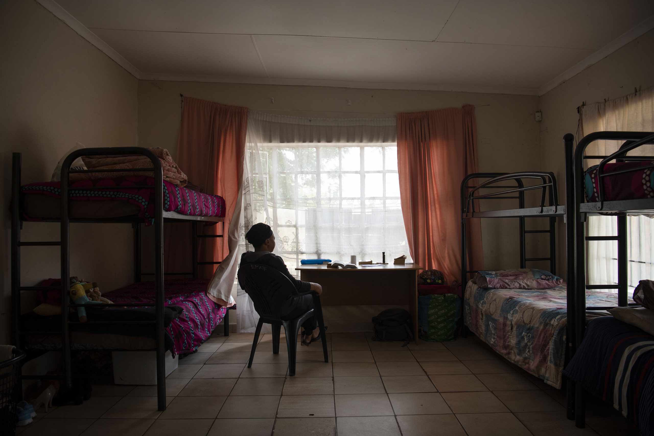 13 December 2019: A resident in her room at the women’s shelter. 