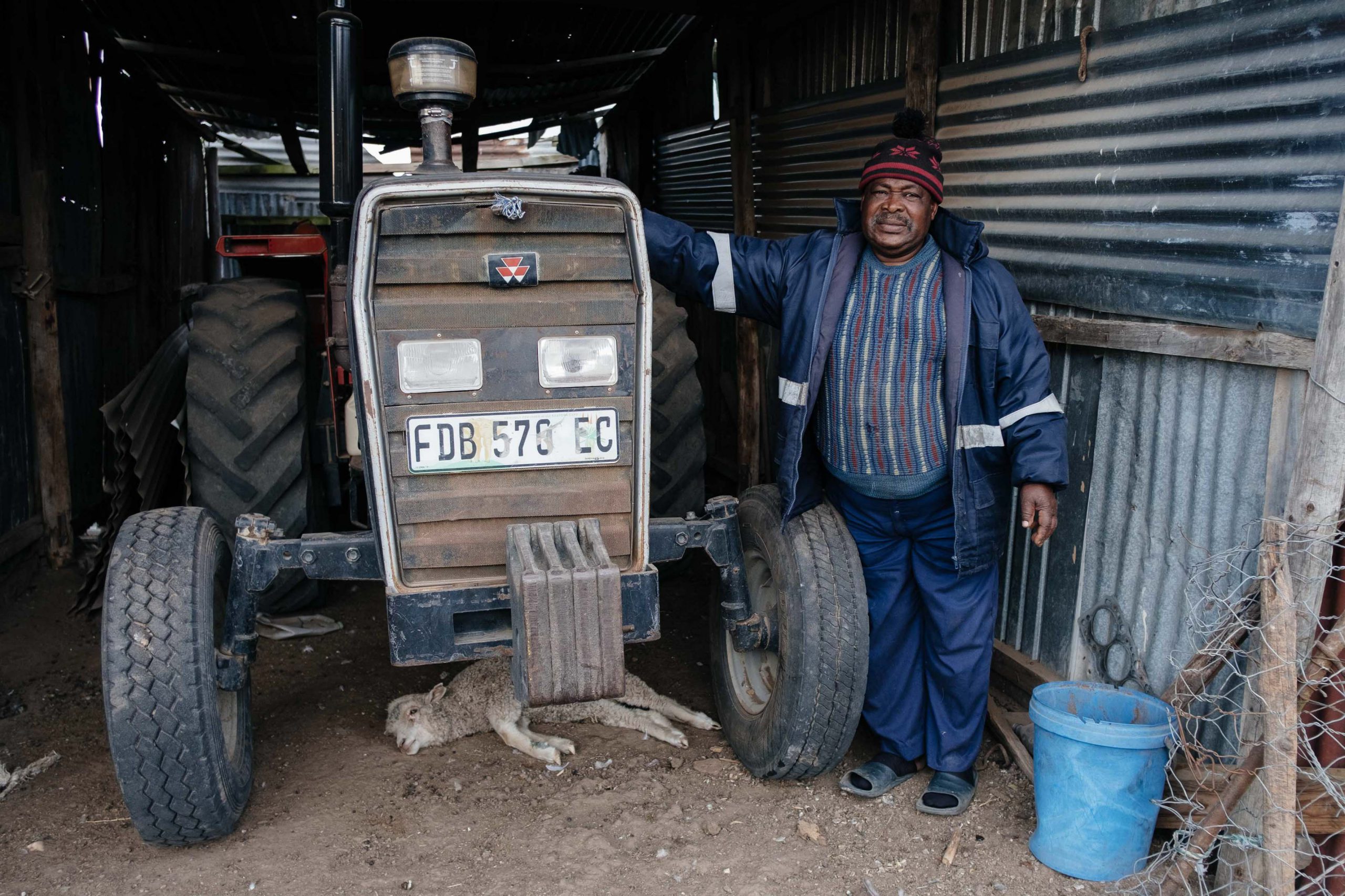 10 November 2019: Farmer Samuel Mthobeli Mwahla, 67, at his tractor shed in Nqgwele Village near King William’s Town in the Eastern Cape. Unpredictable rainfall has meant that many locals have held off on planting crops in newly ploughed land. 