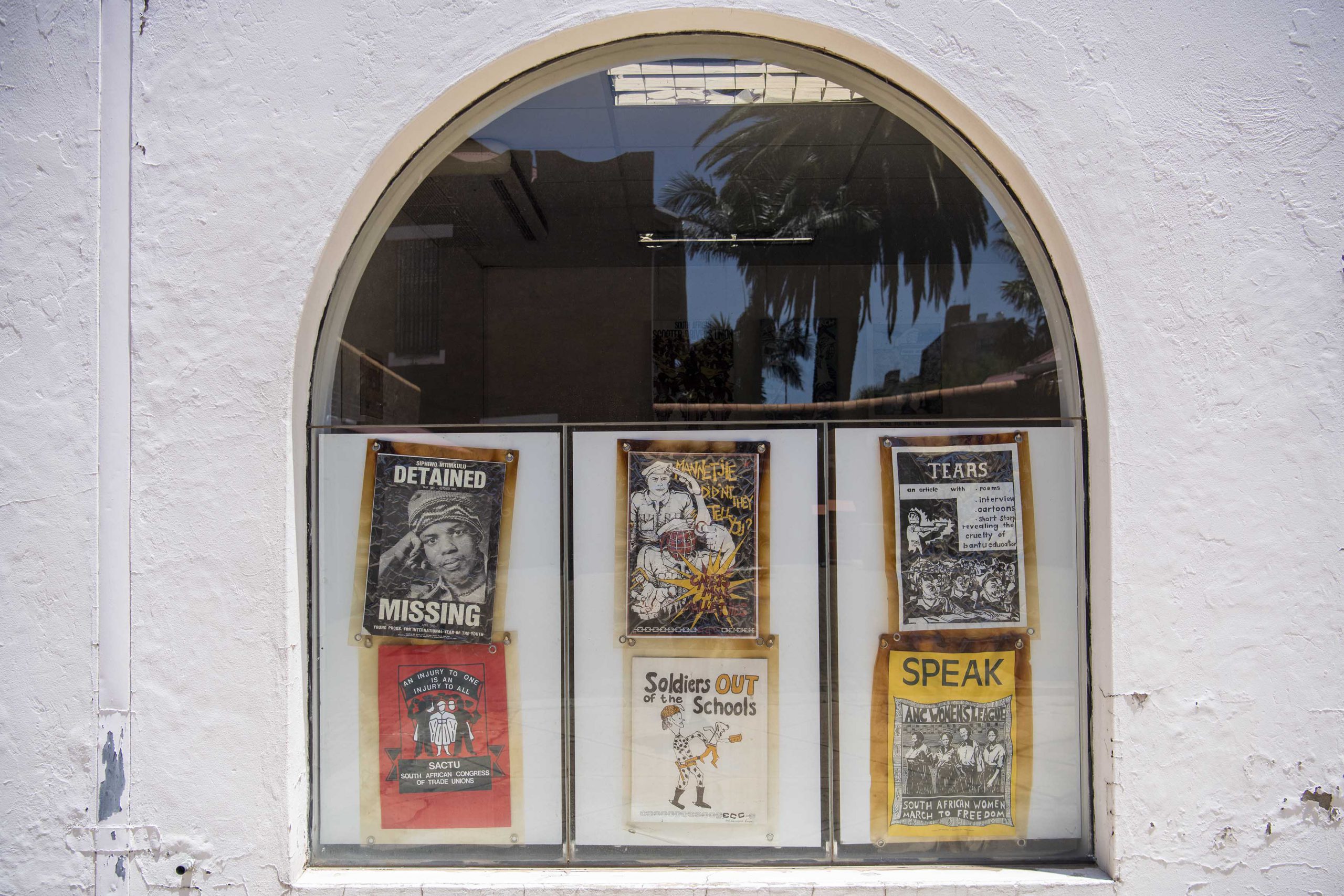 3 February 2020: Historical posters on display in the window of the reading room at the South African History Archive.